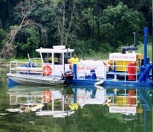 Dredge removing sediment in the Yahara River
