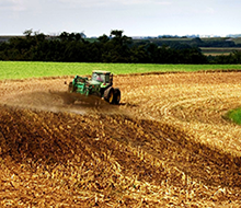 Manure is spread across a farmfield 